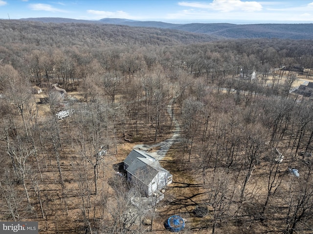 aerial view with a forest view and a mountain view