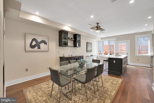 dining room with a ceiling fan, baseboards, dark wood-style flooring, and recessed lighting