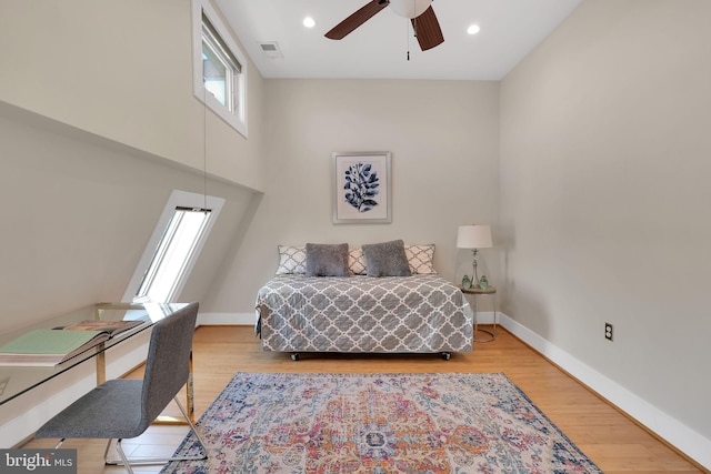 bedroom featuring recessed lighting, baseboards, and wood finished floors