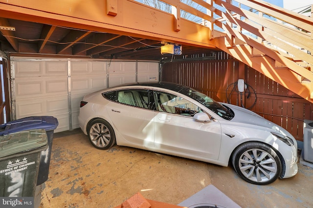 garage featuring a garage door opener