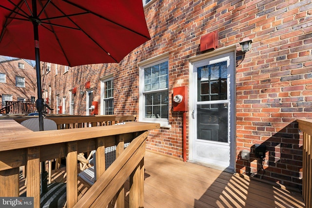 deck featuring outdoor dining area