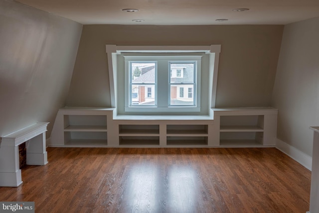 bonus room featuring baseboards, wood finished floors, and recessed lighting