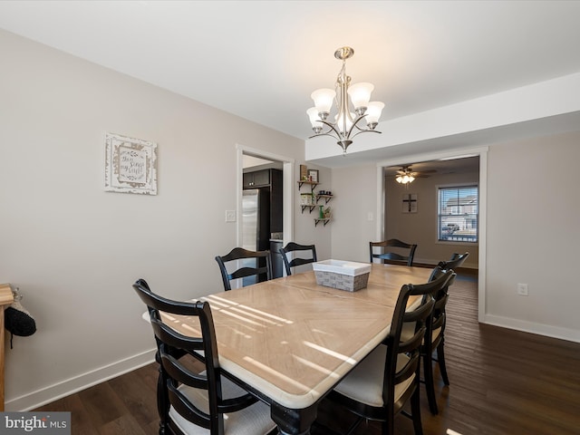 dining area with a ceiling fan, dark wood-style flooring, and baseboards