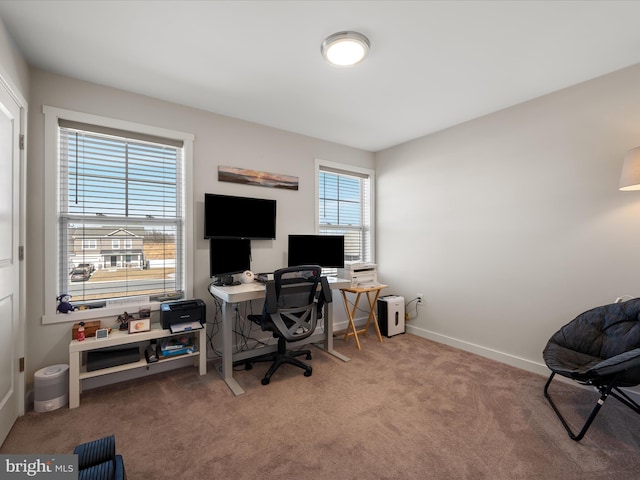 carpeted office with baseboards