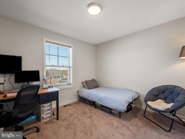 bedroom featuring carpet, visible vents, and baseboards