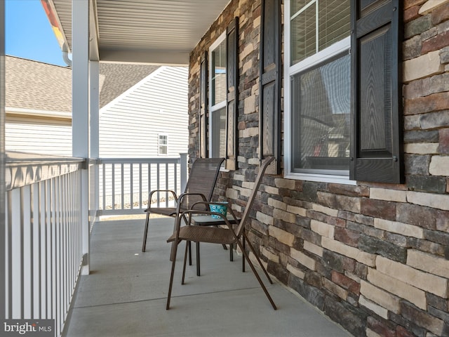 balcony featuring a porch