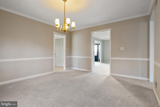 empty room featuring light carpet, a notable chandelier, baseboards, and crown molding