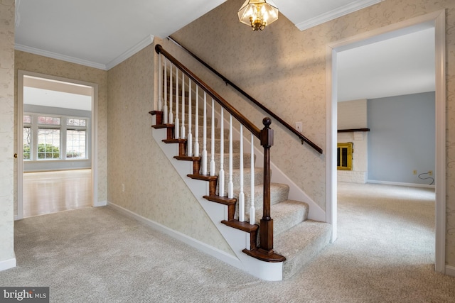 stairs featuring crown molding, carpet flooring, and wallpapered walls