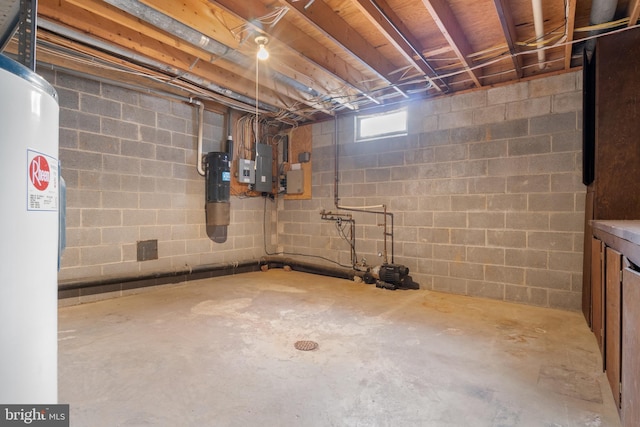 basement with electric panel and water heater