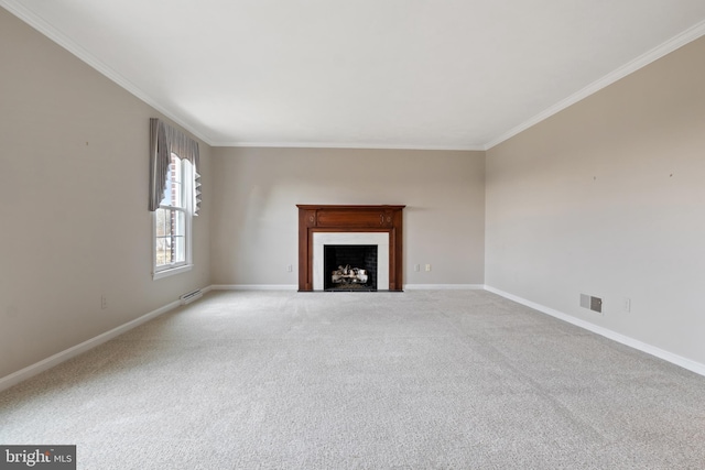 unfurnished living room featuring visible vents, crown molding, and baseboards