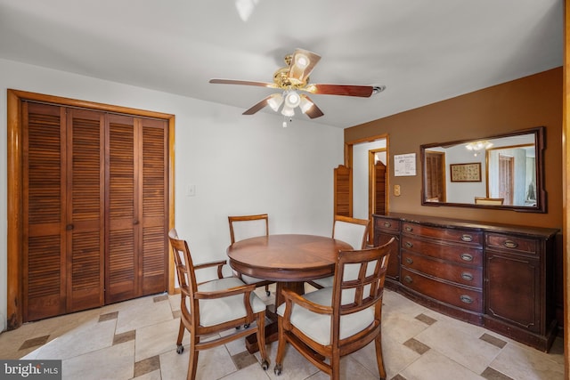 dining room with a ceiling fan