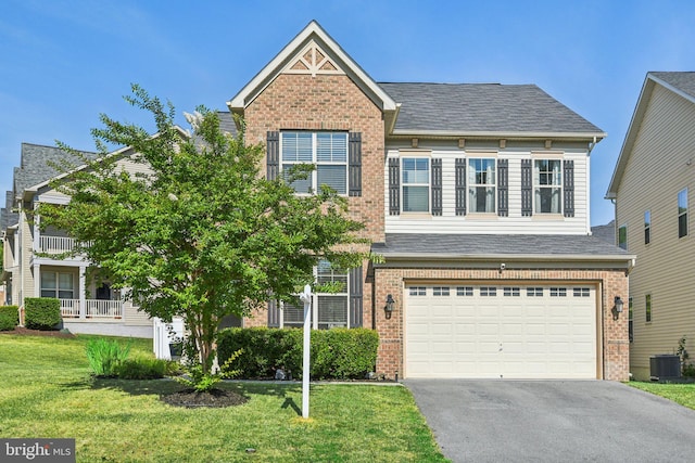 view of front of house with aphalt driveway, brick siding, central air condition unit, an attached garage, and a front yard