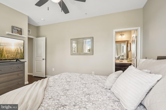 bedroom featuring a ceiling fan, connected bathroom, visible vents, and baseboards