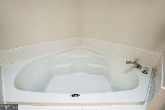 full bathroom featuring a garden tub