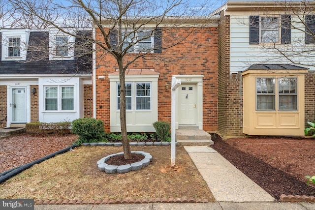 multi unit property featuring brick siding