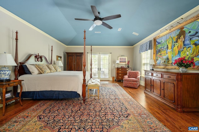 bedroom with lofted ceiling, wood finished floors, a ceiling fan, french doors, and ornamental molding