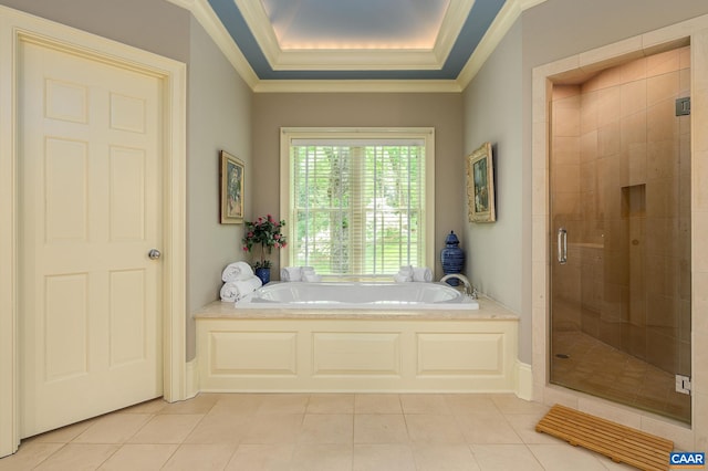 bathroom featuring ornamental molding, a stall shower, tile patterned flooring, and a garden tub