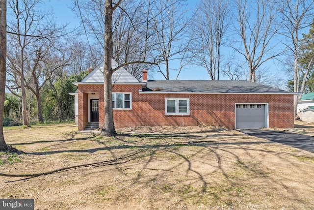 exterior space with an attached garage and driveway