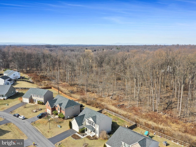 bird's eye view featuring a view of trees