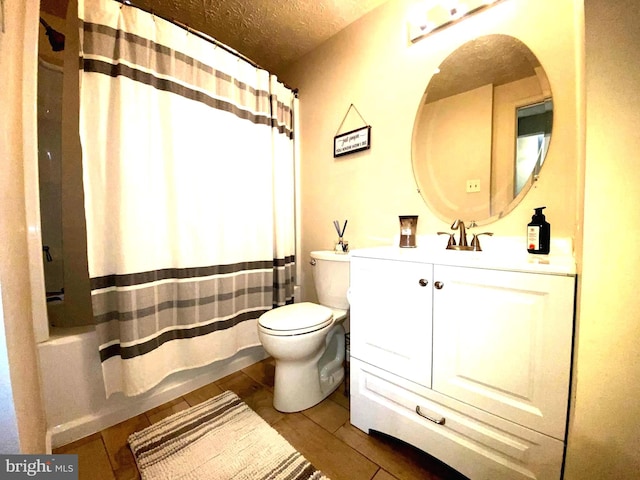 bathroom with a textured ceiling, toilet, wood finished floors, vanity, and shower / bathtub combination with curtain