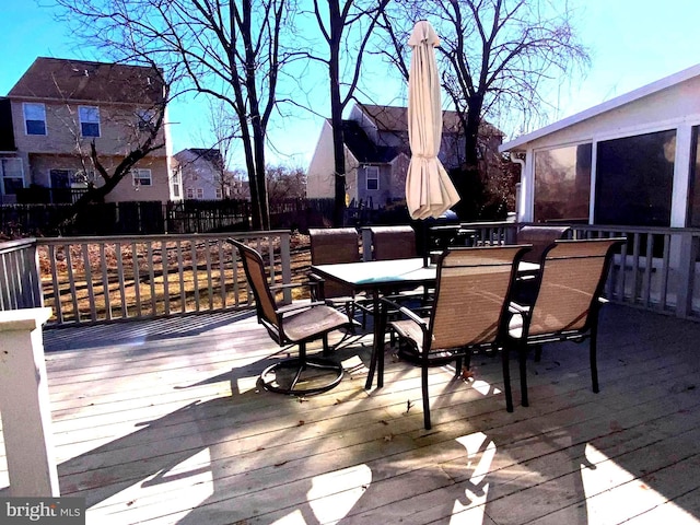 deck with outdoor dining space