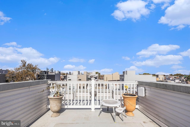 balcony featuring a view of city