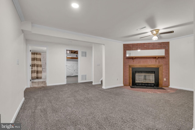 unfurnished living room with carpet floors, visible vents, and ornamental molding