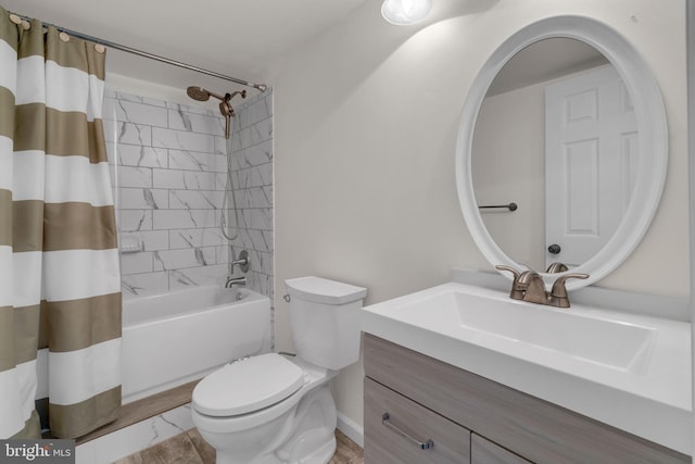 full bath with toilet, vanity, and shower / tub combo