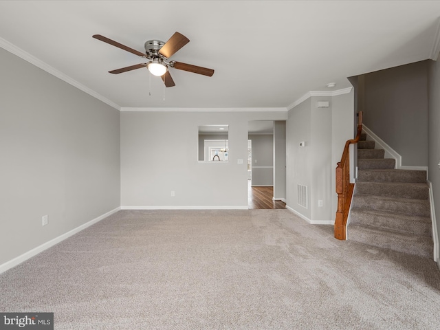 unfurnished living room featuring stairs, carpet floors, baseboards, and crown molding