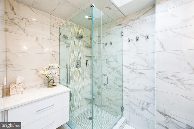 bathroom with a shower stall