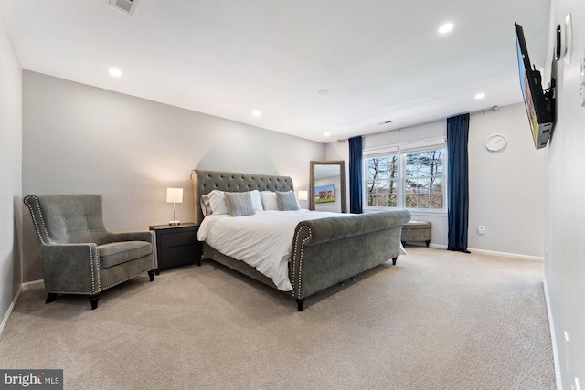 bedroom with light carpet, baseboards, and recessed lighting