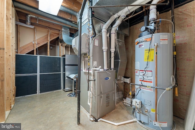 utility room featuring gas water heater