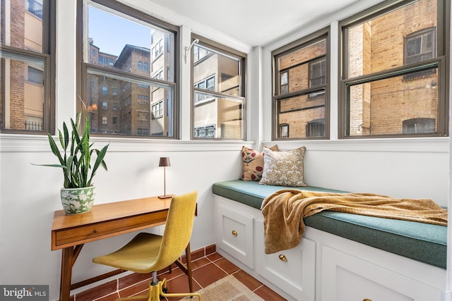 sitting room featuring tile patterned floors