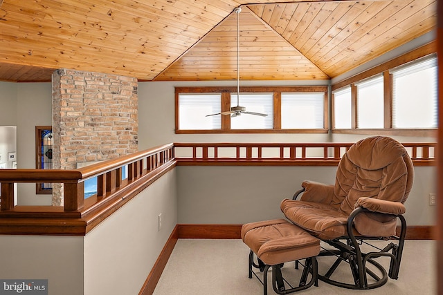 sitting room with carpet, wood ceiling, vaulted ceiling, ceiling fan, and baseboards