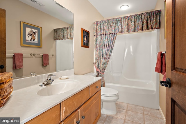 bathroom featuring tile patterned flooring, toilet, vanity, visible vents, and shower / bath combo with shower curtain