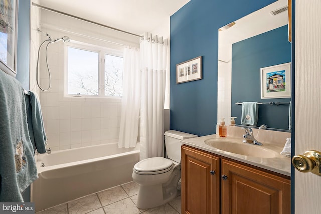 bathroom featuring visible vents, toilet, tile patterned flooring, shower / bath combination with curtain, and vanity