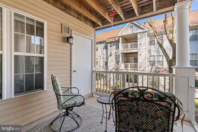 balcony featuring visible vents