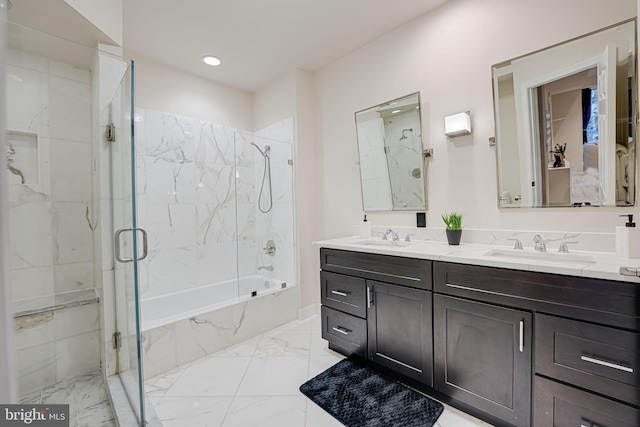 full bathroom with marble finish floor, a marble finish shower, a tub with marble appearance, and a sink