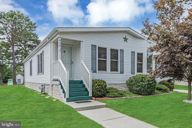 view of front of house with a front yard