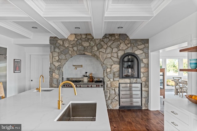 803 Coachway, Annapolis, MD 21401 - kitchen featuring light stone counters, beamed ceiling, dark wood-type flooring, and a sink