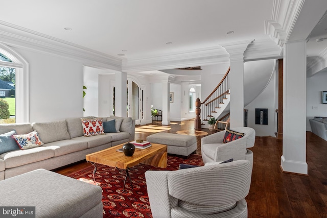 803 Coachway, Annapolis, MD 21401 - living room featuring wood finished floors, baseboards, decorative columns, stairs, and crown molding