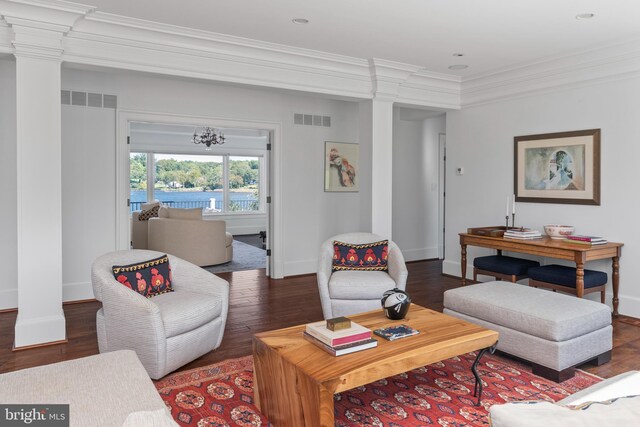 803 Coachway, Annapolis, MD 21401 - living area featuring decorative columns, baseboards, visible vents, and ornamental molding