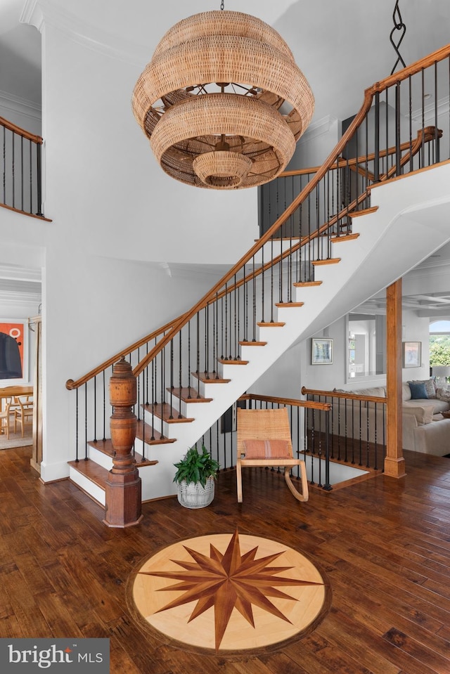 803 Coachway, Annapolis, MD 21401 - stairway with hardwood / wood-style flooring, a notable chandelier, and a towering ceiling