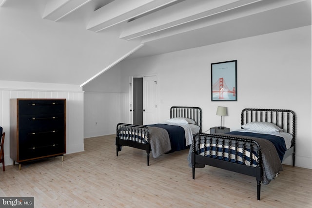803 Coachway, Annapolis, MD 21401 - bedroom with lofted ceiling with beams, wood finished floors, and wainscoting