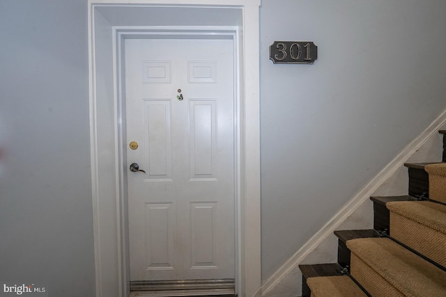 staircase with baseboards