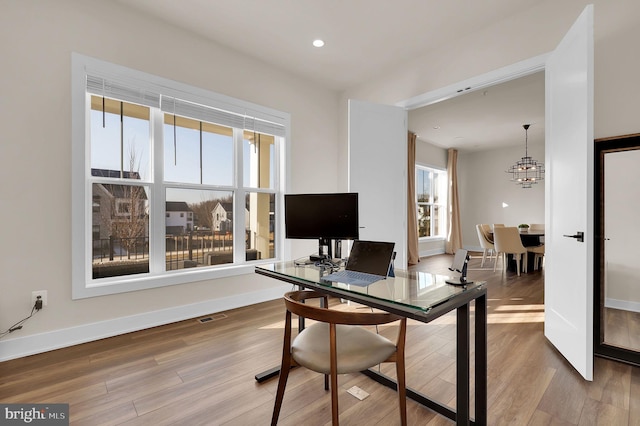 home office with visible vents, recessed lighting, baseboards, and wood finished floors