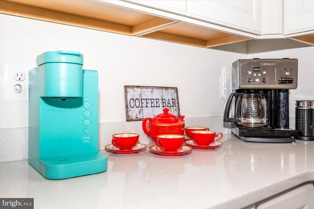 details with white cabinets and light countertops