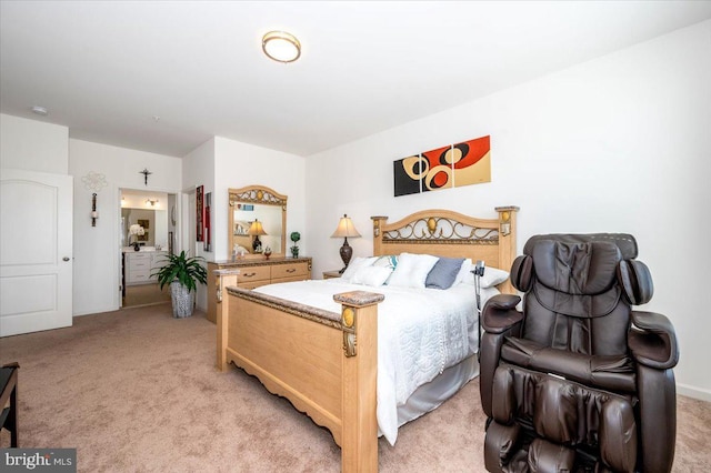 bedroom featuring light carpet