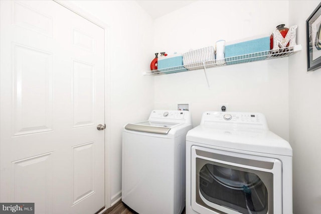 laundry room featuring laundry area and separate washer and dryer