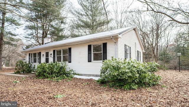 view of front of property featuring metal roof